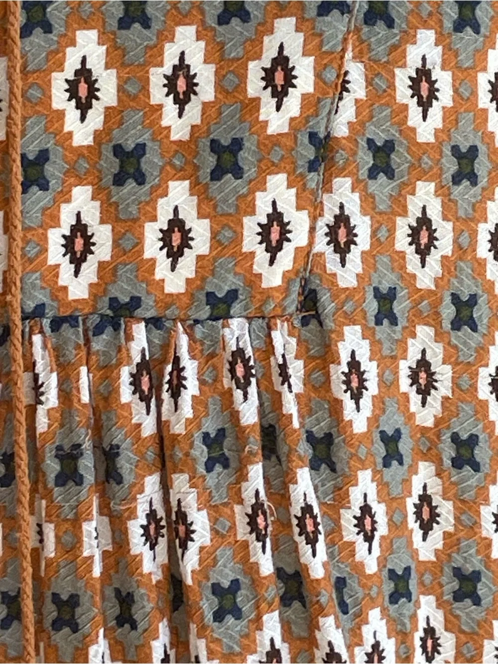 Pleione Orange Patterned Tassel-Front Boho Peasant Top.